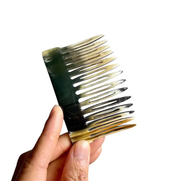 The 3-in-1 Horn Comb: Detangle. Secure. Style
